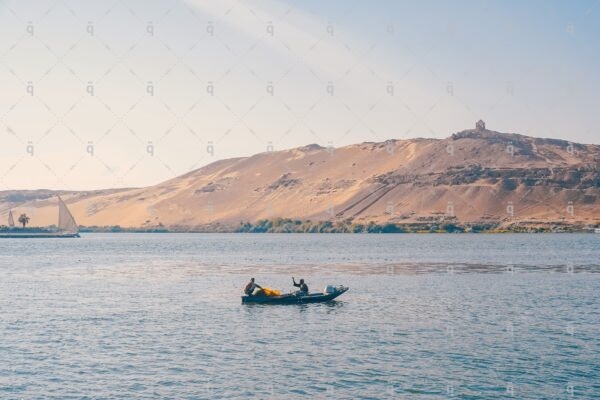 A boat in the middle of the Nile