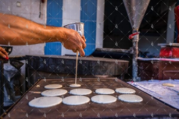 Preparing qatayef dough