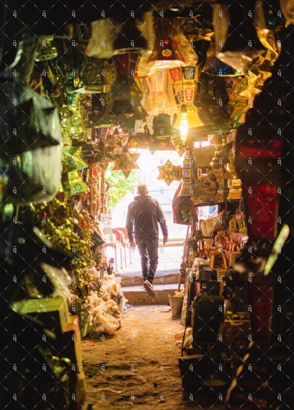 A man in a lanterns store