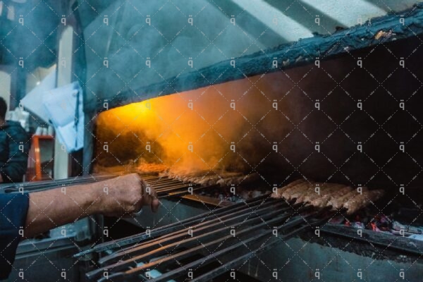 A man grills food